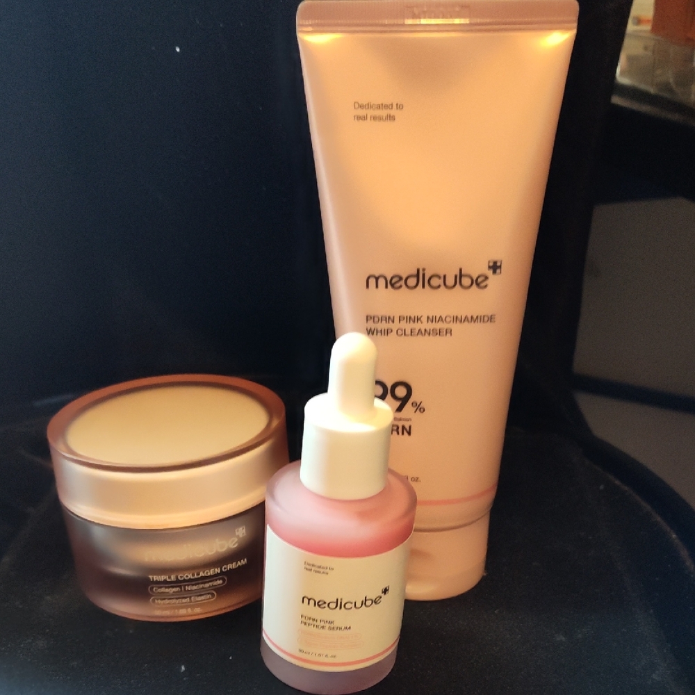 Medicube Skincare Set with Pink and Cream Tones